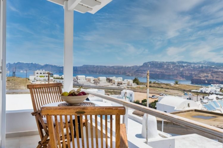 Enjoy your Balcony Overlooking the Santorini Sea